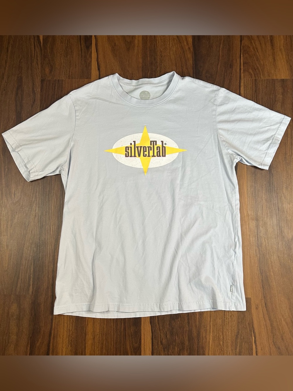 Levi’s SilverTab Jeans Light Blue Short Sleeve Graphic Tee with Yellow star Logo